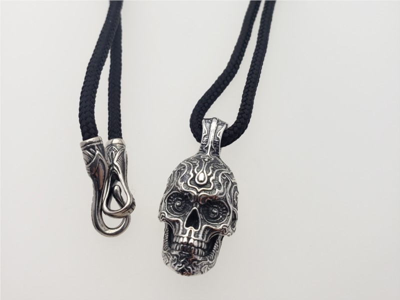 "Renegade" sterling silver skull pendant and paracord necklace by William Henry Studio