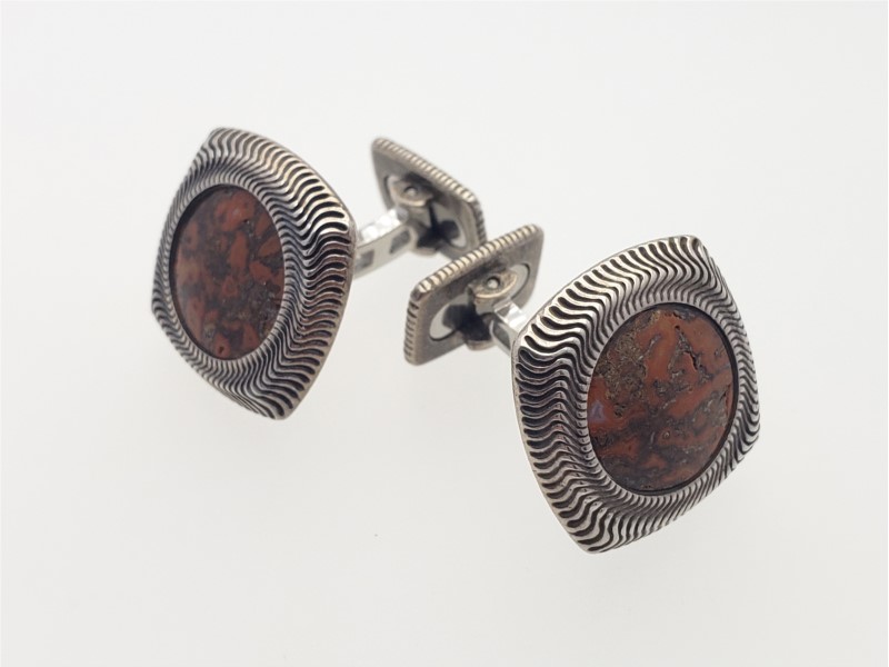 Apatosaurus dinosaur fossil cufflink with stainless and sterling silver by William Henry Studio