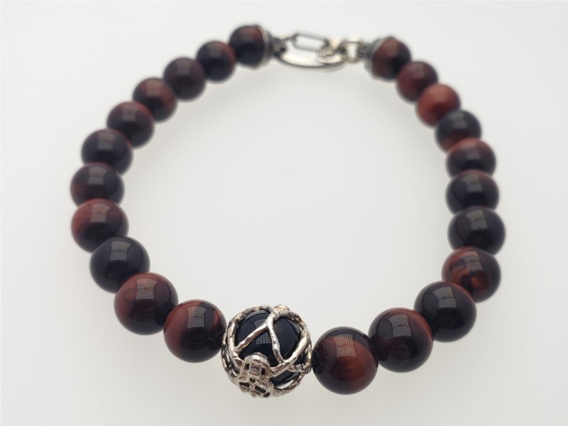 "Sunset" bead bracelet of black onyx, red tiger eye, and skull motif in sterling silver by William Henry Studio